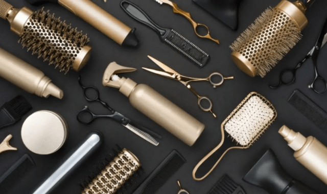 comb brush scissor dryer gold and black background