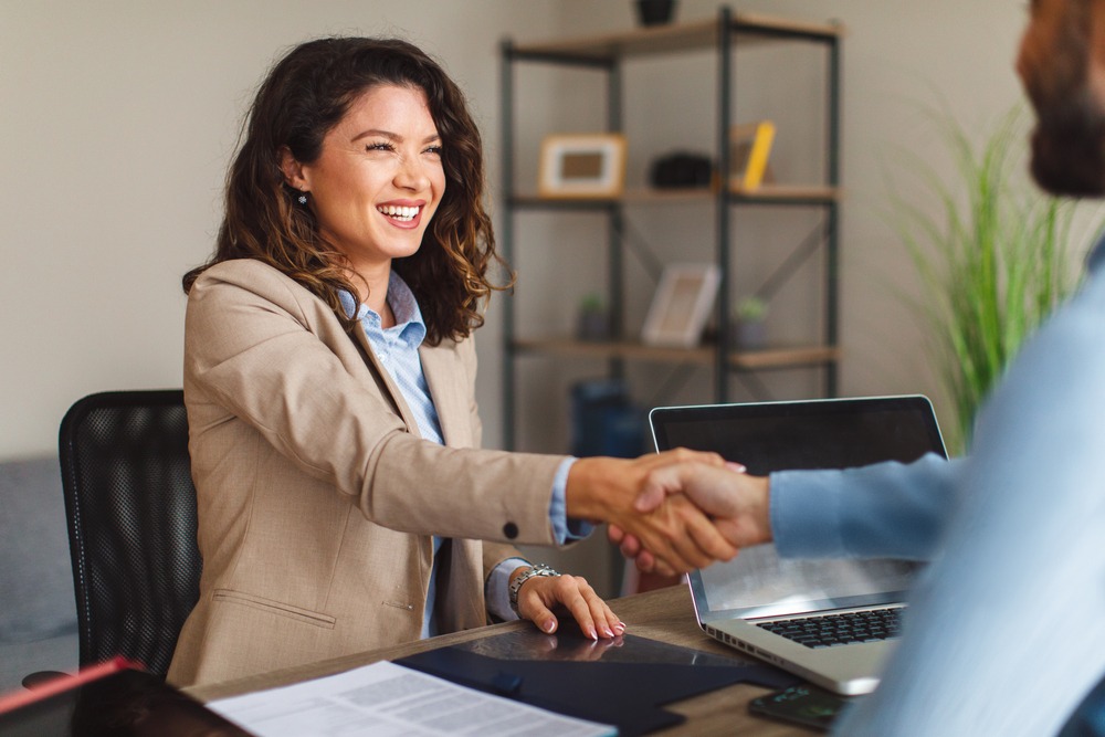 Seller and buyer shaking hands