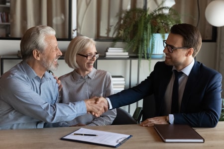 Client shaking hands with their agent